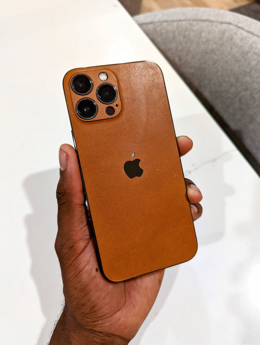 MKBHD's tweet photo. Wasn't sure if I'd like combining leather with metal and glass but damn @dbrand it's kinda lit https://t.co/ZlQXb6SkyR