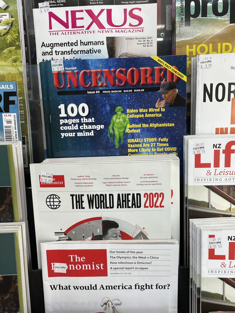 PSpoonley's tweet photo. Someone has a sense of the absurd at PaperPlus in Havelock North. The Economist alongside a NZ magazine peddling some of the more puzzling Covid conspiracy myths on offer. The shop assistant was  not prepared to discuss why it would sell such a publication. https://t.co/9hBm5zUR4T