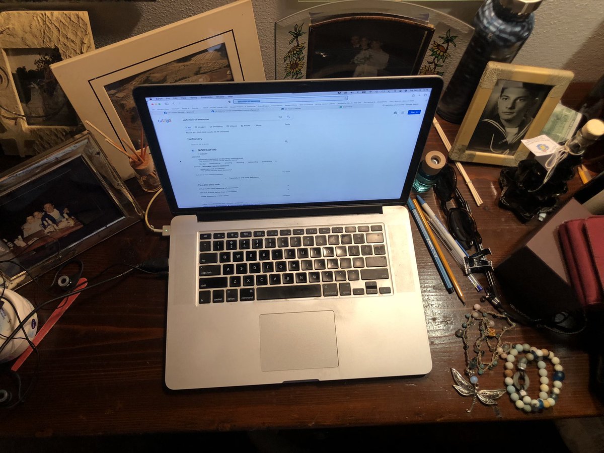 CristinaZenato's tweet photo. My former school years desk is now the place for picture frames and memories; kind had to plow forward to make space for my laptop. #visitingmom #memories https://t.co/Fjukj51aOH