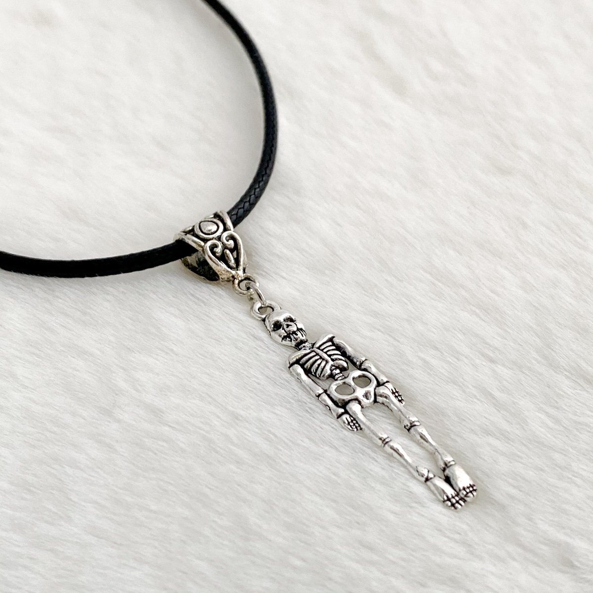 monalaina's tweet photo. Skeleton Pendant Necklace, Black Cord Necklace, Skeleton Charm Necklace, Halloween Jewelry, Spooky Jewelry, Gothic Necklace, S381 https://t.co/3UR8DxXTIH #Earrings #Handmade #SmallBusiness #EtsyShop #GiftforHer #EtsyJewelry #Jewelry #BlackCordNecklace https://t.co/jKo8yElQTX