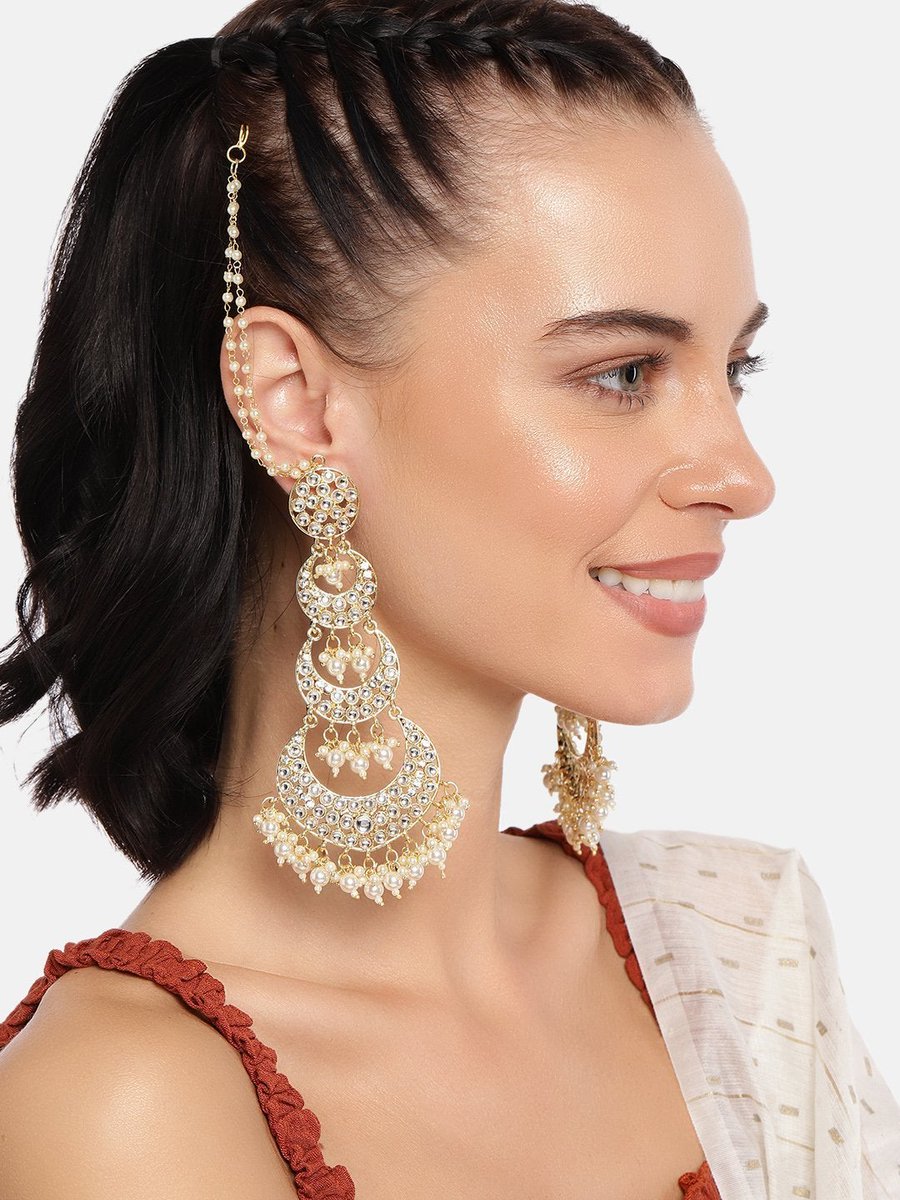 TrendiaGlobal's tweet photo. Statement jewellery pieces that are exclusively made for creating drama to your look is this one right here. 
The extravagant gold-plated Kundan &amp; Pearl earrings by I Jewels is a must-have for weddings and festivities. 
Grab it from https://t.co/YvxPzR9Njg at an amazing price. https://t.co/oKLHESX9Dx