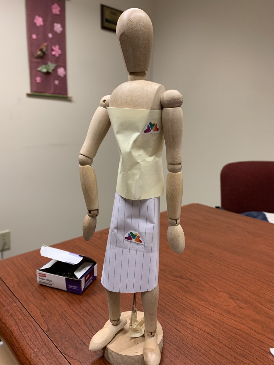 My kid is at work with me for a short while today, occupying himself in my office with various knickknacks I have around. "Mom look," he says. "I made an <a href="/NPR/">NPR</a> uniform." (cc: <a href="/ProjectRunway/">Project Runway</a>)