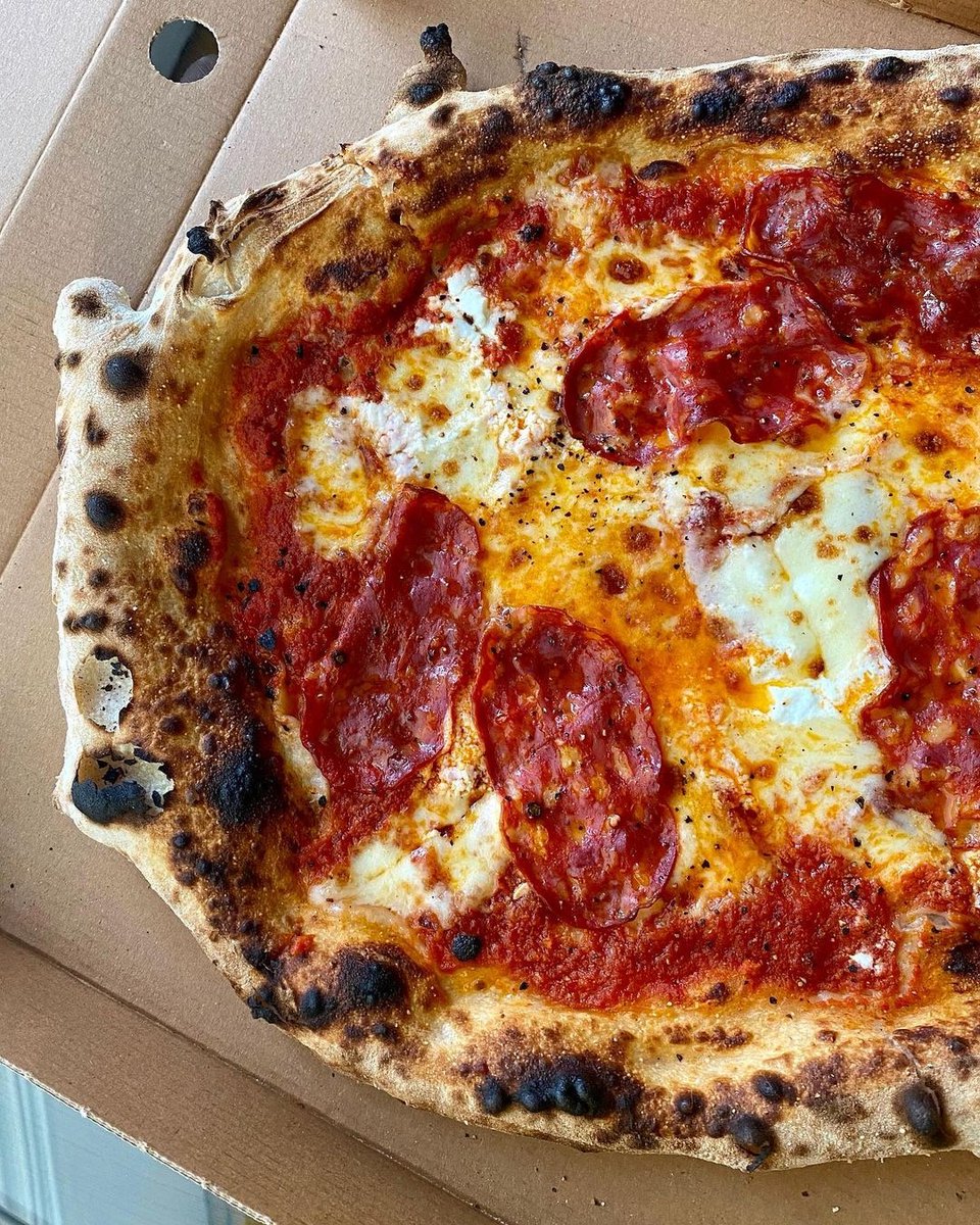MadForMozza's tweet photo. No one wants to cook during Christmas &amp; New Year, so ordering a Mozza takeaway from @deliveroo sounds like the perfect plan for dinner. Our girl @hilarycaneat on Instagram showing off our number 5 in style here. 🍕 https://t.co/VrublxLRRN