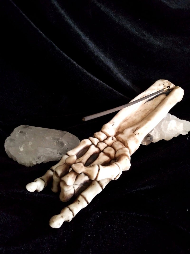 MerchantDark's tweet photo. Horns Up for Satan! This is a wicked and cool incense burner in the shape of a skeleton hand. Visit: https://t.co/G1YthEyejt   #Satanicritual #Satanism #occult #witchcraft #DarkMoonMerchant https://t.co/IfdnOdsrlZ