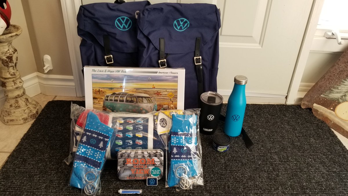 Kenneth_Reimer's tweet image. My @VWcanada 500,000km swag box arrived today!  It's absolutely terrific.  Backpacks, vw socks, coffee and water cups, blanket, puzzle, keychains, playing cards, stickers and more!  What a great present, thank-you!  Loving my VW.
