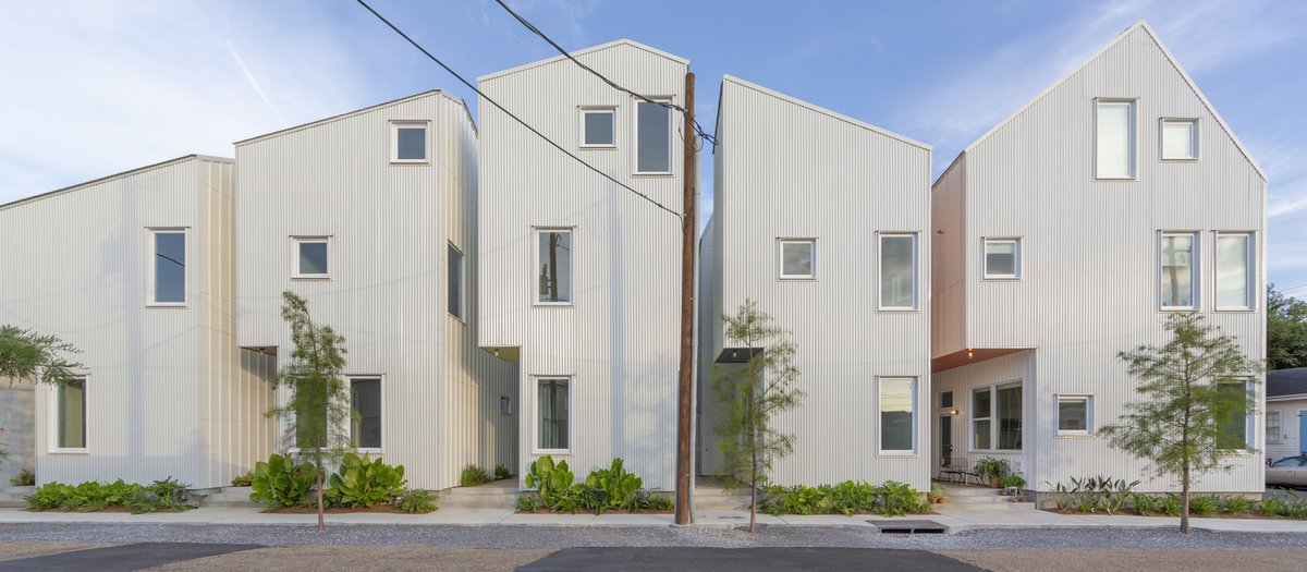 Cobylefko's tweet photo. In the US, it's long been thought that homes can either be affordable, or well designed, but not both (&amp; often neither).

@OfficeJT_'s starter homes are the beautiful exception to this thought.

12 really high quality homes on a lot zoned for 3, affordable for new families https://t.co/9OCx15Iw0j