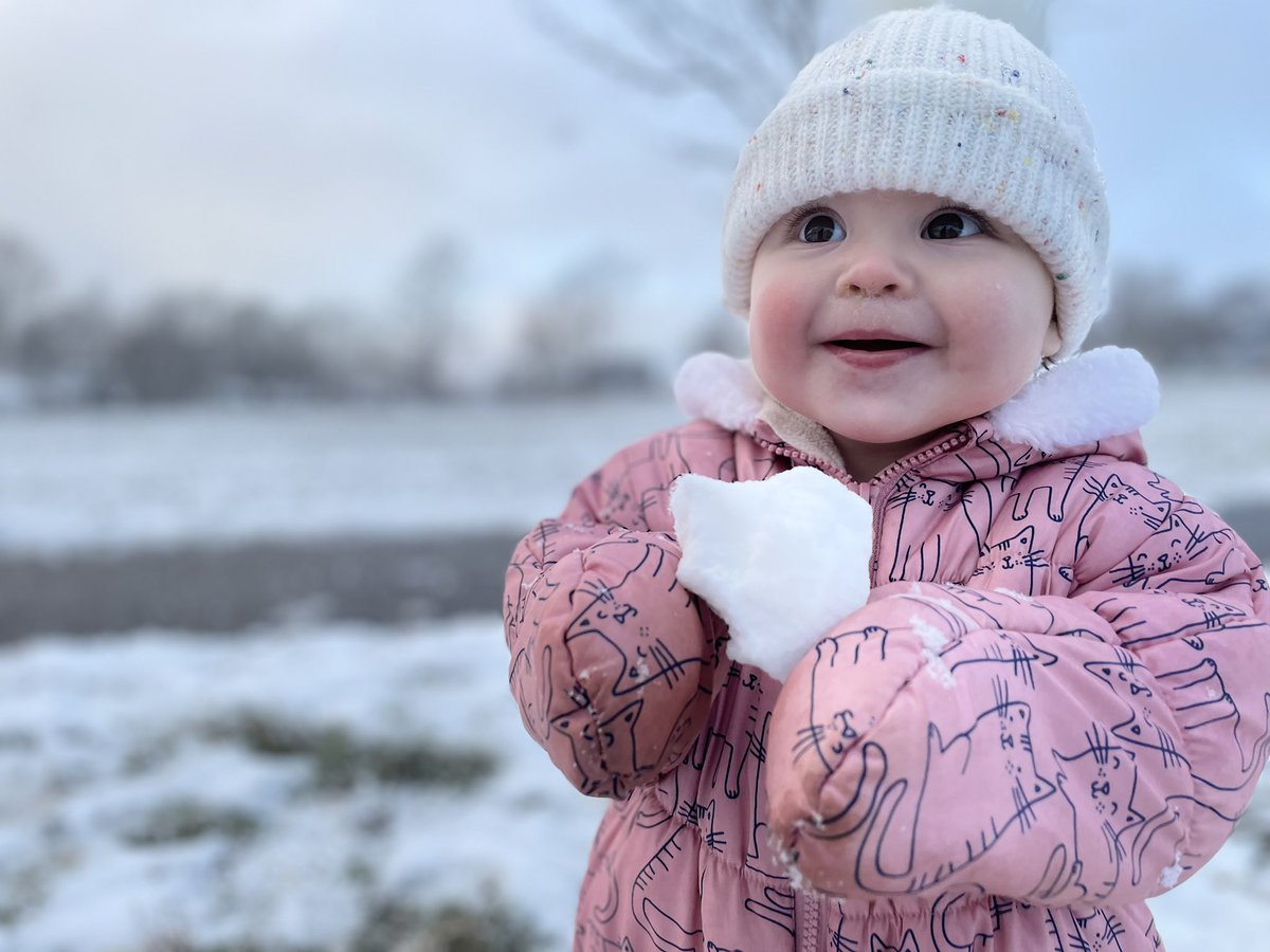 May I interrupt your Omicron doom scrolling with this shot of our one-year-old enjoying the magic of winter.