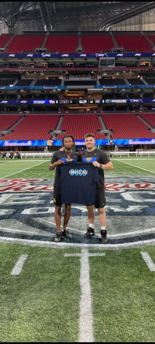 Burrell_PE's tweet photo. @ScarlettMLewis @BSDBucs Choose Love Shirt making an appearance at great @CFAPeachBowl. Can't thank @jP5_ERA @Tipton_05 enough for spending time with our students and discussing the importance of Mental Health Awareness. @Pitt_FB @Pitt_ATHLETICS 
#H2P https://t.co/UkGcacY7a8