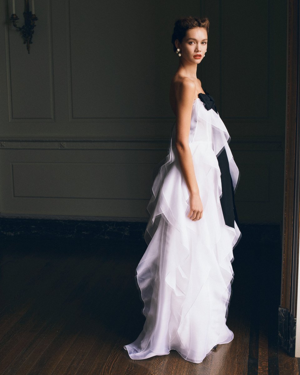 HouseofHerrera's tweet photo. Layers of delicate white organza adorn this strapless gown with center bow that is bond to turn heads. Shop now on https://t.co/qJ3bScouoR
https://t.co/ddZ41itxbN https://t.co/xExD3oEvip