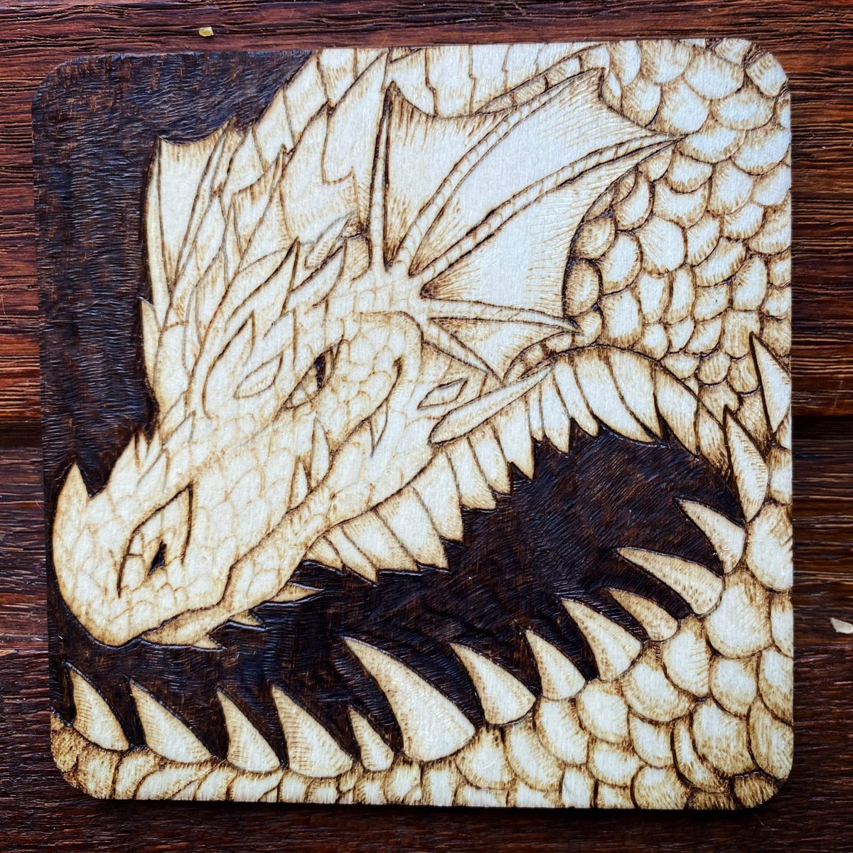 Spiny dragon for this 4x4 pyrography piece! #dragon #pyrography #woodburning #dragonart