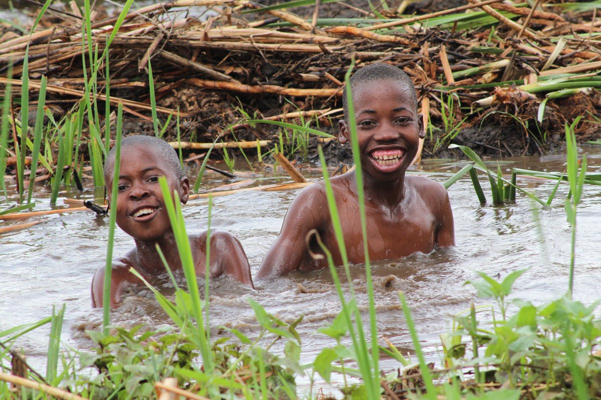 #Childhoodgames. What games did you like during rainy season? This is happiness undiluted #RAW #FRESH. Free minds, no money- no fancy swimming pool still happy,  they don't care -  no one's but their happiness. Happiness can be cultivated. 
@pleistocenefilm @mfutumalo @chamkoka