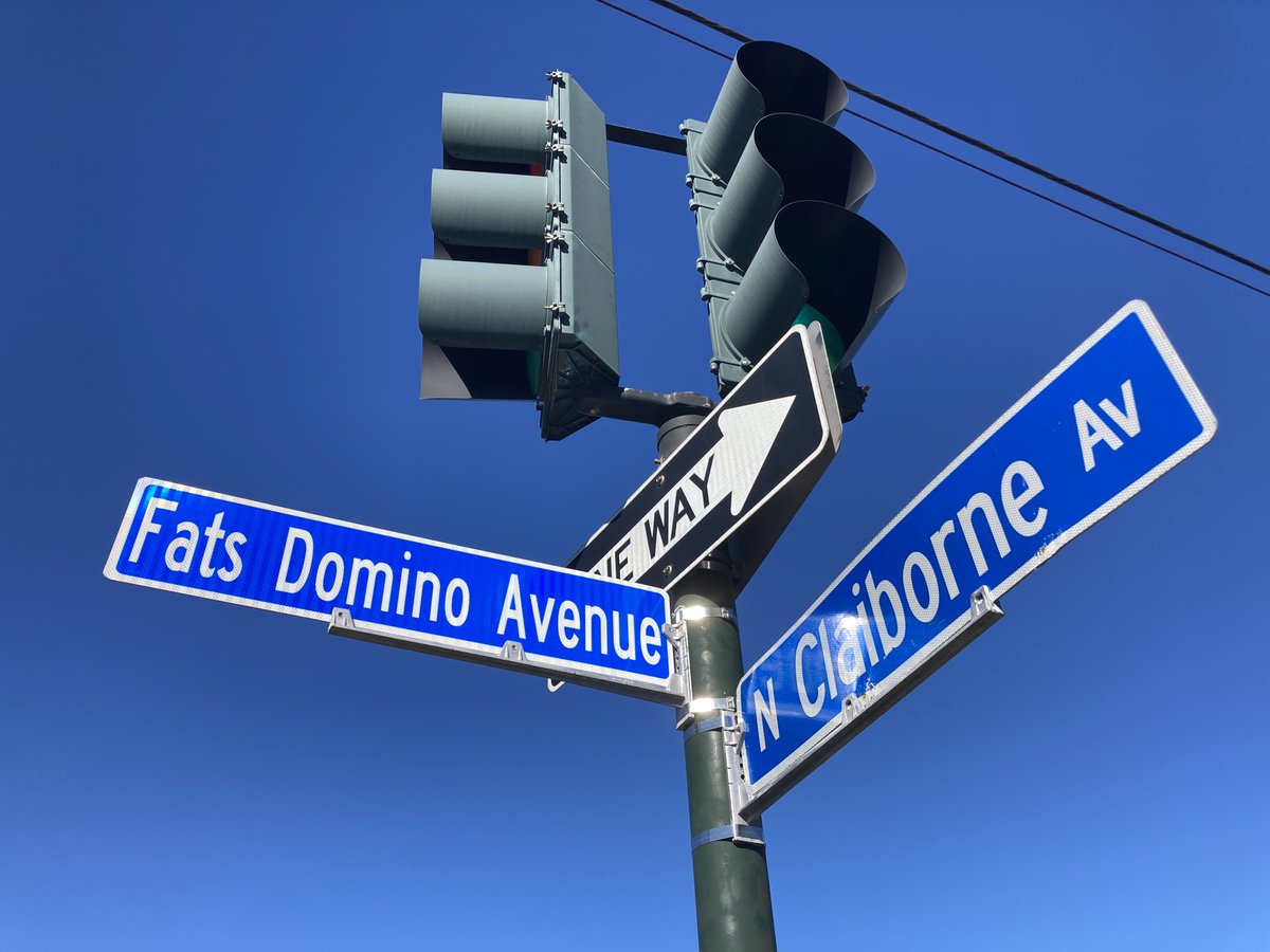 wwoz_neworleans's tweet photo. The new Fats Domino Avenue sign is up at the corner of Fats Domino Ave. and Claiborne in the Lower 9th Ward! Learn more about the piano great's former home on this street at WWOZ's A Closer Walk, an interactive New Orleans music history map: https://t.co/uQSovZJlll. https://t.co/3PyX2O6JHi