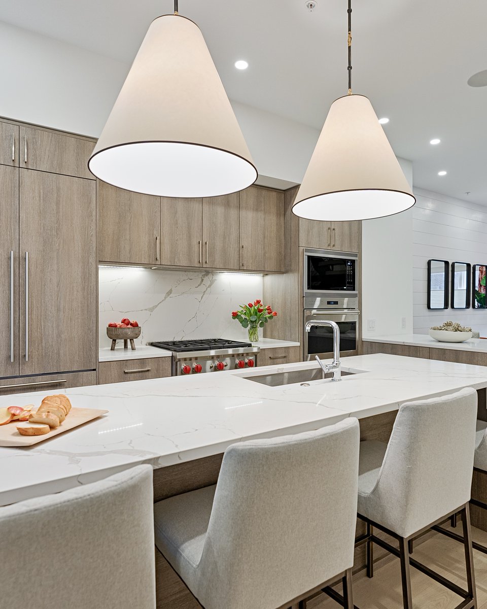 A SNEAK PEAK inside our most recent interior design project in Logan Square ✨ This kitchen features two waterfall islands, custom cabinetry &amp; oversized neutral pendants! We can’t wait to show you the completed project‼️ How would you design your dream kitchen 💭

#thinkhenck