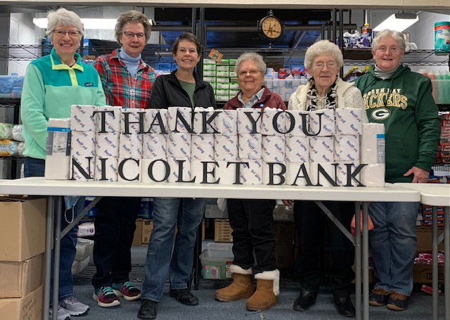 NicoletBank's tweet photo. Representatives from the PEP Project in Rhinelander crafted a creative thank you in appreciation of the donation received from the Nicolet National Foundation. The pantry stocks personal and home cleaning products for those in need. #employeedriven #nicoletnationalfoundation https://t.co/qpS1e9yi1R