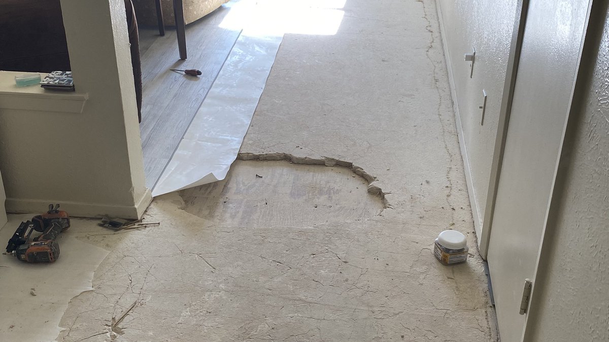 IncorrectLabel's tweet image. so turns out the concrete of our apartment was super fucked up and the previous floors were installed incorrectly. Can’t even sleep at the house tonight lmao. Can’t wait to yell at my landlord bout this.