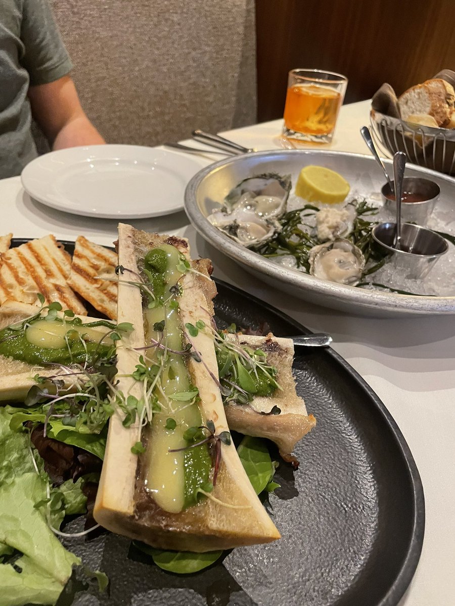 Emilnem's tweet photo. Roasted bone marrow &amp; oysters + 6 oz filet with pt Reyes blue cheese butter, twice baked loaded potato, brussel sprouts and herb mushrooms 🤤 #AnniversaryDinner #LBSteak https://t.co/81cx2LvjVe