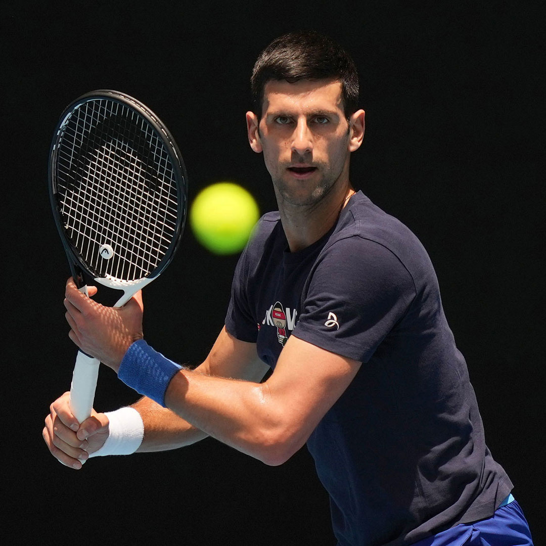 Novak Djokovic practices at Melbourne Park ahead of the 2022 Australian Open.