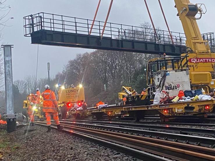 Quattro_Plant's tweet photo. During Christmas the #Qarmy was primed and ready to get to work for @lundyprojects installing signal gantries and Cantilever structures. Have a look at the Quattro AC40 rail cranes deftly place the structures in place in Streatham and Clapham. #sleighinit #AC40 #railcrane #RRV https://t.co/5ZNsq3A7eE