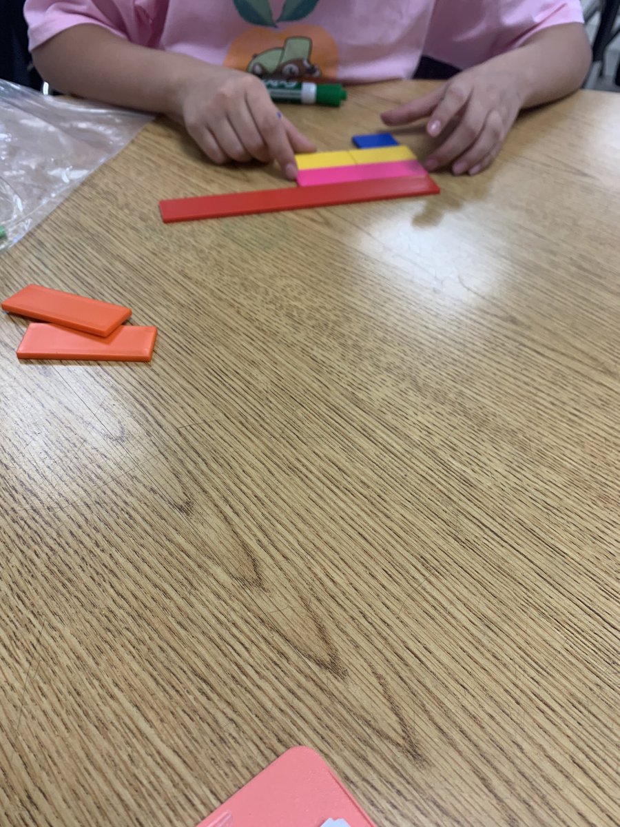 csg0623's tweet image. Exploring with Fraction bars to find fractions equal to 1/2! On their own Ss discovered that when the numerator is 1/2 of the denominator the fraction is equal to 1/2!! Now we are going to use that rule to compare fractions with unlike denominators!!!