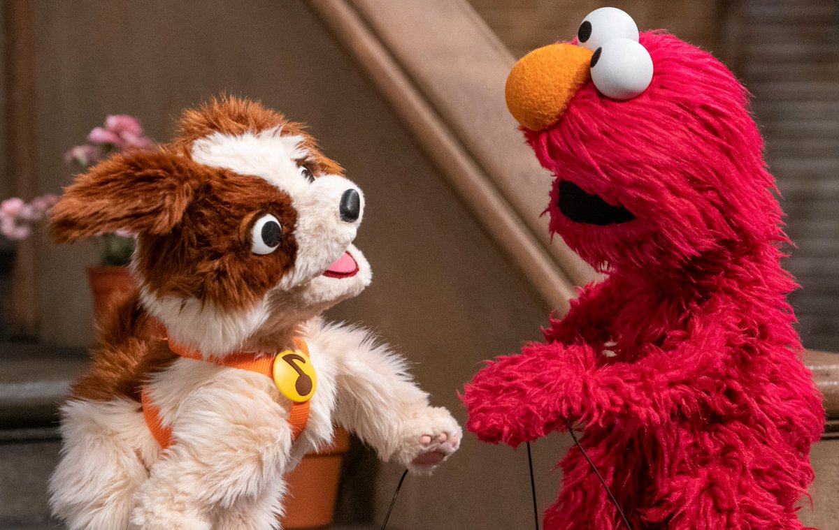 elmo's tweet photo. When Elmo's puppy Tango is excited, she gets the wiggles! And between you and Elmo, Elmo does too! #FurryFriendsForever https://t.co/ujdtOdRn50