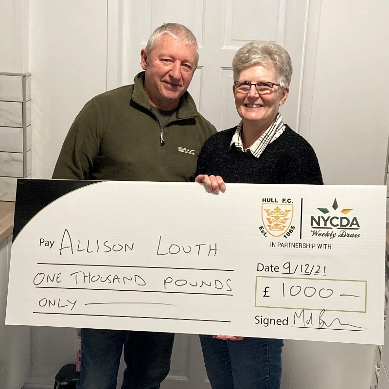 hullfcofficial's tweet photo. Join our weekly lottery draw, in partnership with NYCDA to be in with the chance of winnings £1000s in cash prizes every single week...👀

Just like Hull FC supporter Allison Louth and husband Tony, who bagged £1000 just before Christmas! 💰

Find Out More 👇