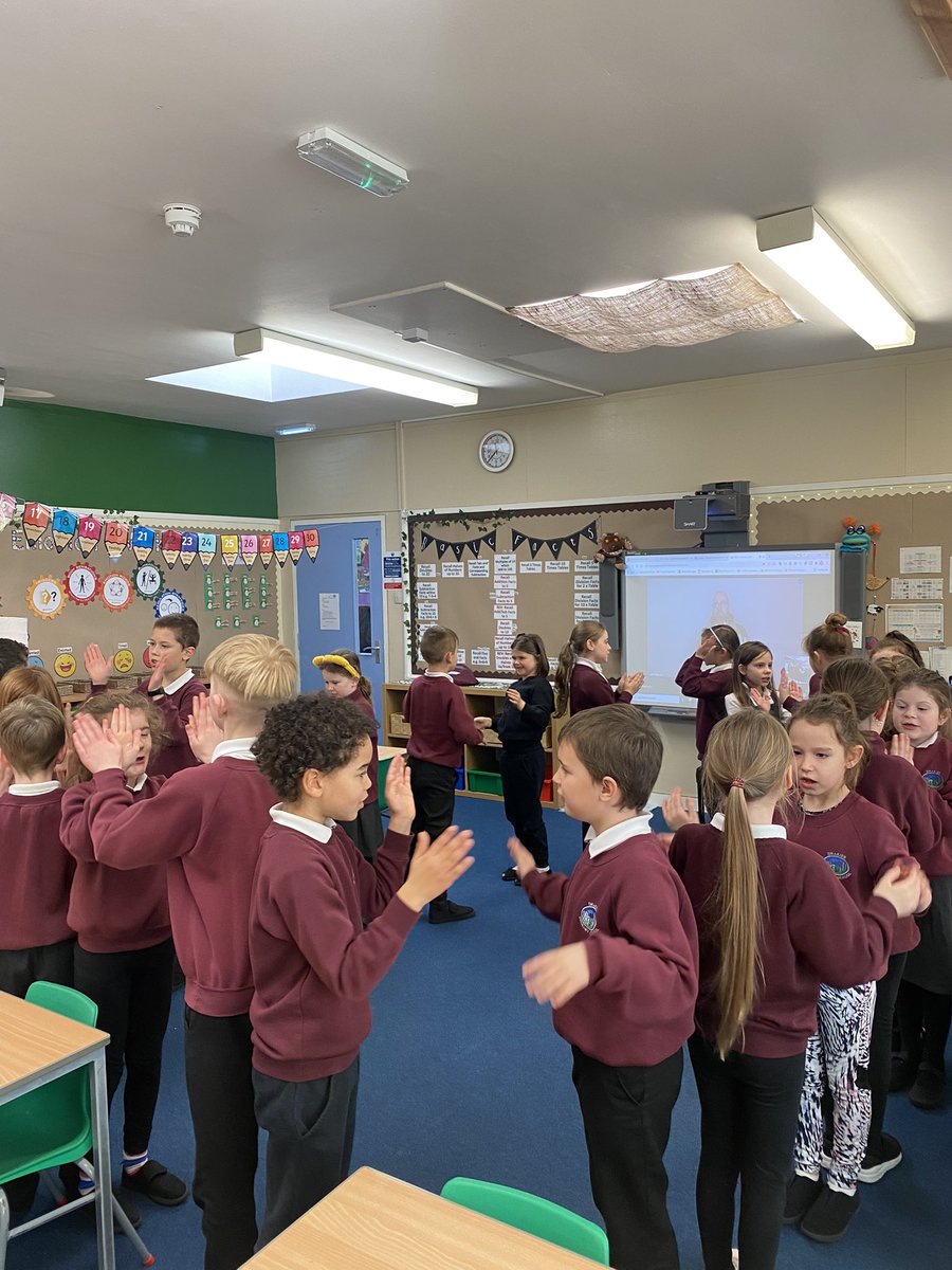 Jennife74258458's tweet photo. It is lovely to be back teaching P3/4. This week we were lucky to have Mr Thomson online for a Kodaly singing session. Here are a few pictures of the class enjoying the song ‘Acha Bacha’! @DrakiesPS https://t.co/Pv6wB0asYv