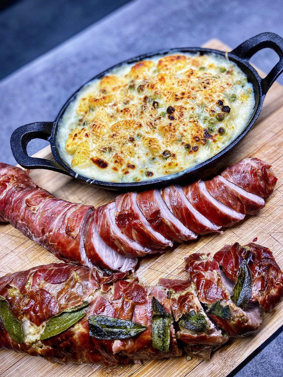 smokeymaysbbq's tweet photo. Prosciutto pork fillet with cheesy gnocchi and pea gratin 

Yesterdays dinner was a really tasty dish from @jamieoliver 

Some nice pork fillets wrapped up in prosciutto, one with a layer of pesto added for extra flavour and finished with some crispy sage leaves. https://t.co/AeCVEPfa9p