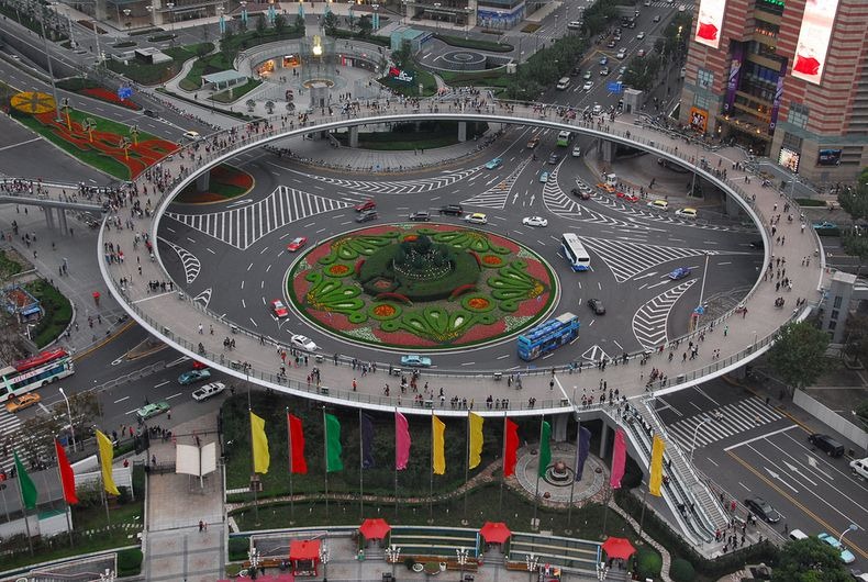 Able_Engineers's tweet photo. Just ICYMI this engineering feat, about 10 years ago in China, the Lujiazui circular pedestrian bridge was opened. It enables pedestrians to avoid traffic almost 20 ft above the street with numerous escalator stairway entrances and exits.#coolstructures #bridge #ableengineering https://t.co/DvX0MGQttB