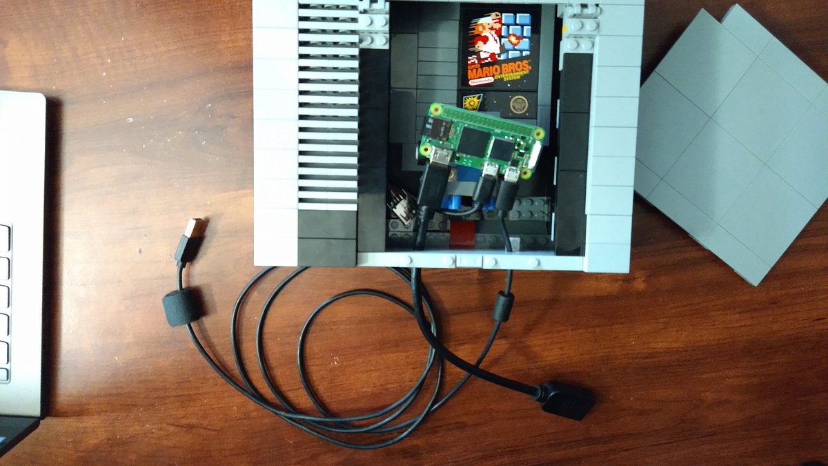 DetectiveDevs's tweet photo. With my amateur engineering skills I managed to cram a #RaspberryPi Zero 2 into the official #LEGO #NES set, while maintaining the original Lego functionality. It's now a functioning game console! https://t.co/ZrmkVtDlFS