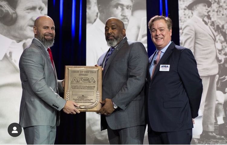 OfficialOPPF's tweet photo. The Coaches Association announced @BowieState head football coach Damon Wilson as the AFCA National Coach of the Year for the NCAA Division II. Wilson (pictured Center) becomes the first CIAA coach to win the prestigious award. Congrats Bro. Wilson!!!! #OmegaPsiPhi https://t.co/RaF5gXGiRj