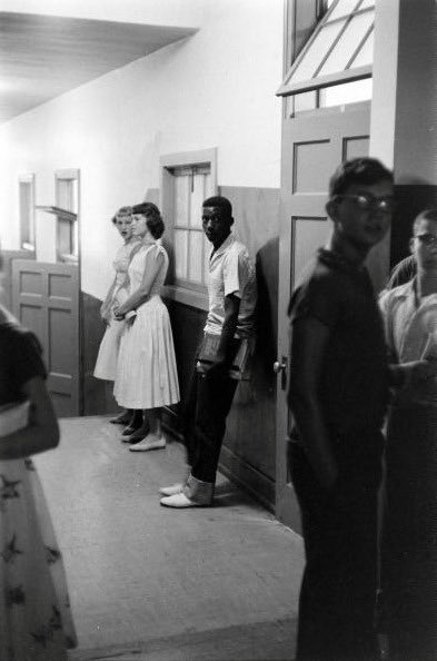 A lone Black student waits for class to start at a newly integrated high school in Clinton, Tennessee, 1956

Photographed by Robert W. Kelley