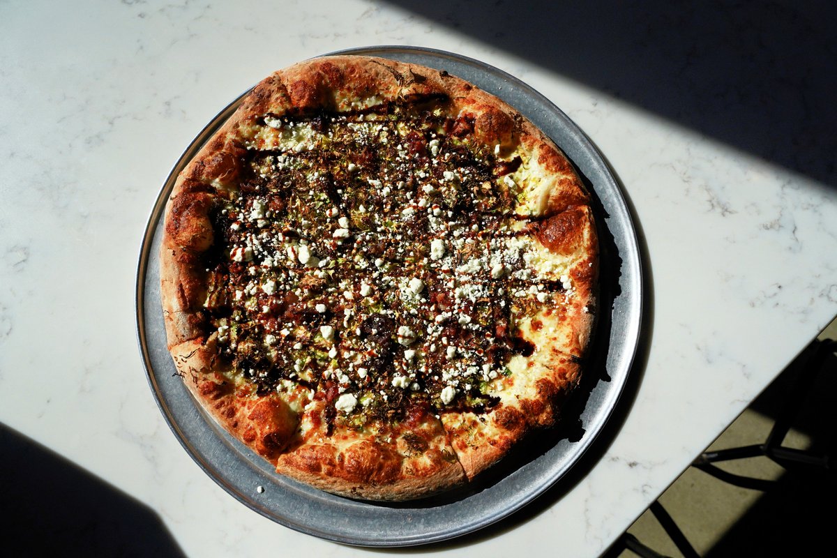 Have you had our “Off The Map’ pie for the January? The All A’Sprout It is topped with crème fraîche, our house cheese blend, roasted Brussels sprouts, caramelized onions, savory bacon, goat cheese, and a balsamic reduction.