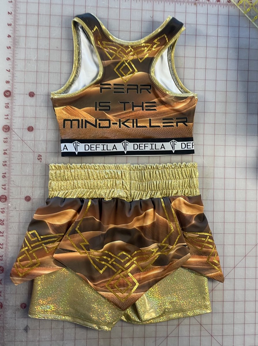 DEFILAsport's tweet photo. Heck yes!  ⁦@aleshazapp⁩ rocking our custom fight kit as always!  DUNE inspired #fearisthemindkiller #invictafc45 ⁦@InvictaFights⁩ https://t.co/e4g4FrXJmH