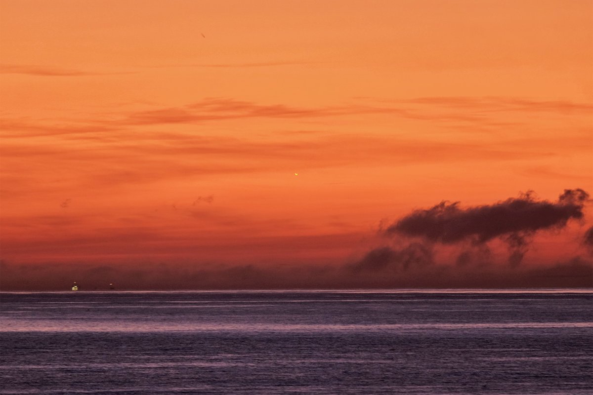 suthers's tweet photo. Five days after it passed between the Earth and the Sun, an event known as inferior conjunction, I managed to photograph Venus low over the sea in the morning sky today. The second image, with an old Sigma 600mm mirror lens, shows the planet's crescent phase. #astrophotography https://t.co/eVRXnM2Jub