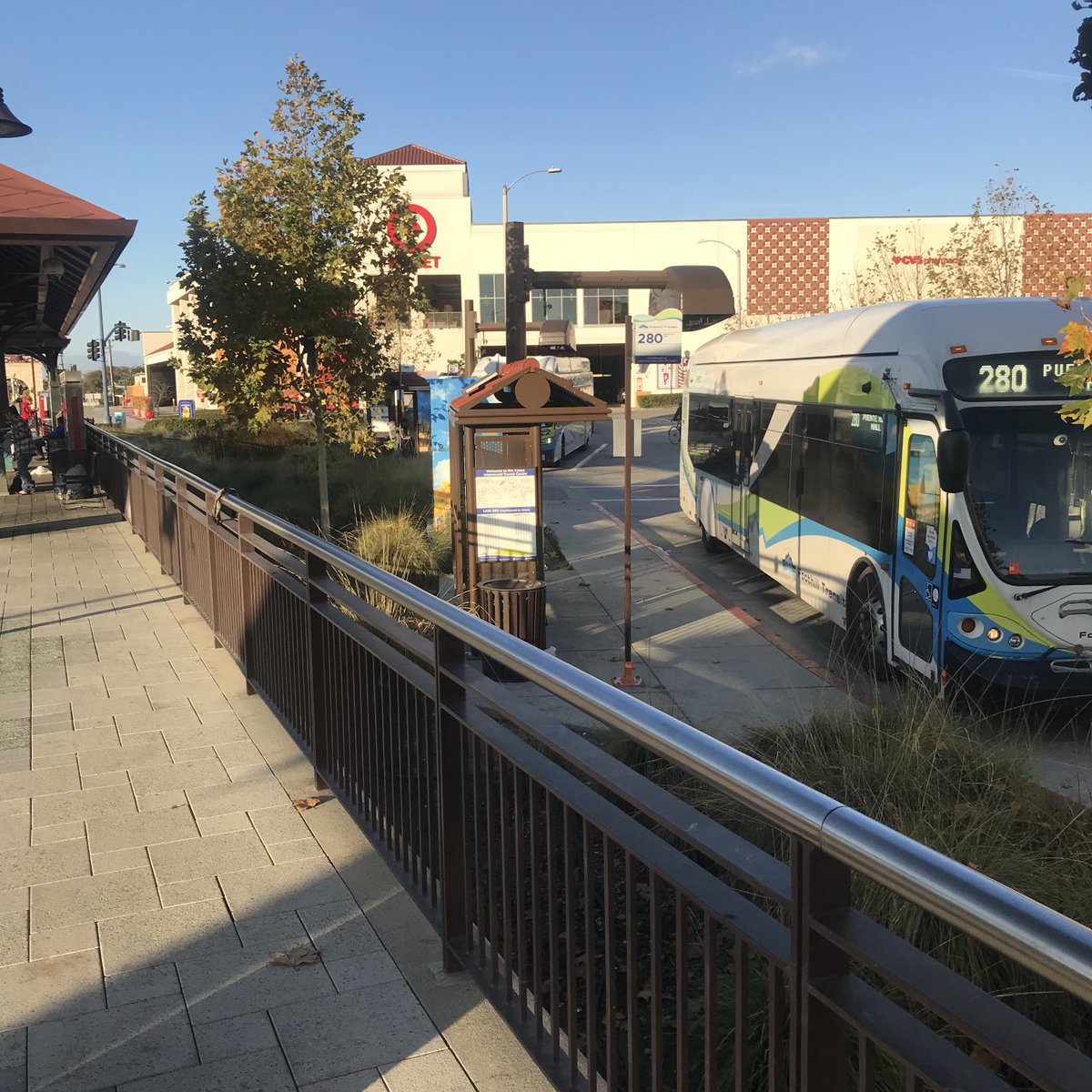 erik_griswold's tweet photo. In any other region there would be a stair and ramp to accommodate the #desireline between the arriving bus bay and the train platform but this project was built by a highway construction team #OnTimeUnderBudget https://t.co/2IFYSSwu2k