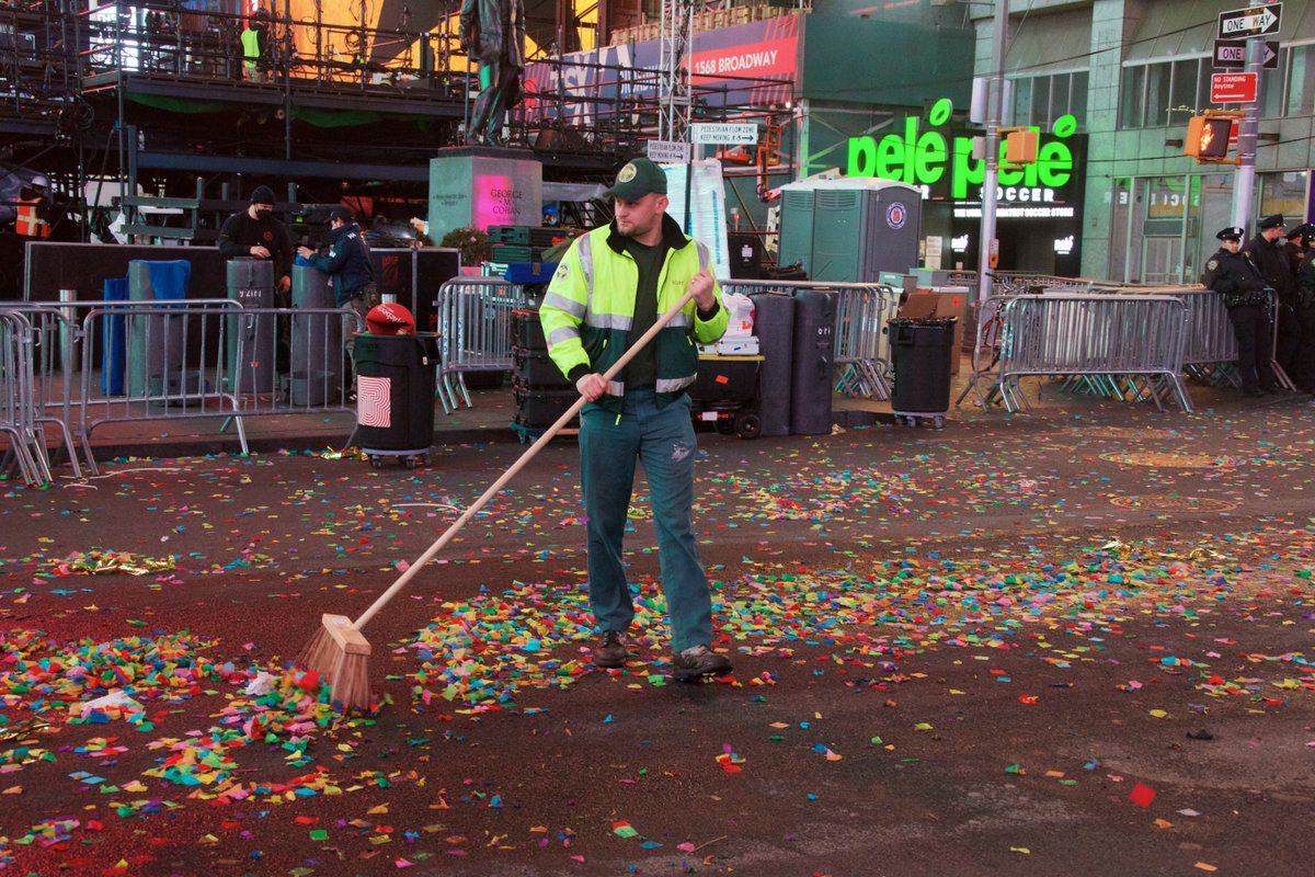 NYCSanitation's tweet photo. After the ball drops in @TimesSquareNYC our work begins! Our 254 Sanitation Workers, using 56 backpack blowers, 36 mechanical brooms and 50 hand brooms, descend on the area early in the new year to pick up every last piece of confetti! Wishing a happy and healthy 2022 to all! https://t.co/Ut7ZfClhbp