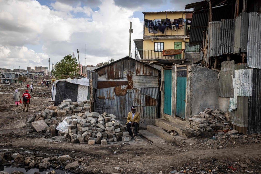 Displaced by development:
A man in Nairobi, Kenya, whose home has been demolished as the result of a road-building project: