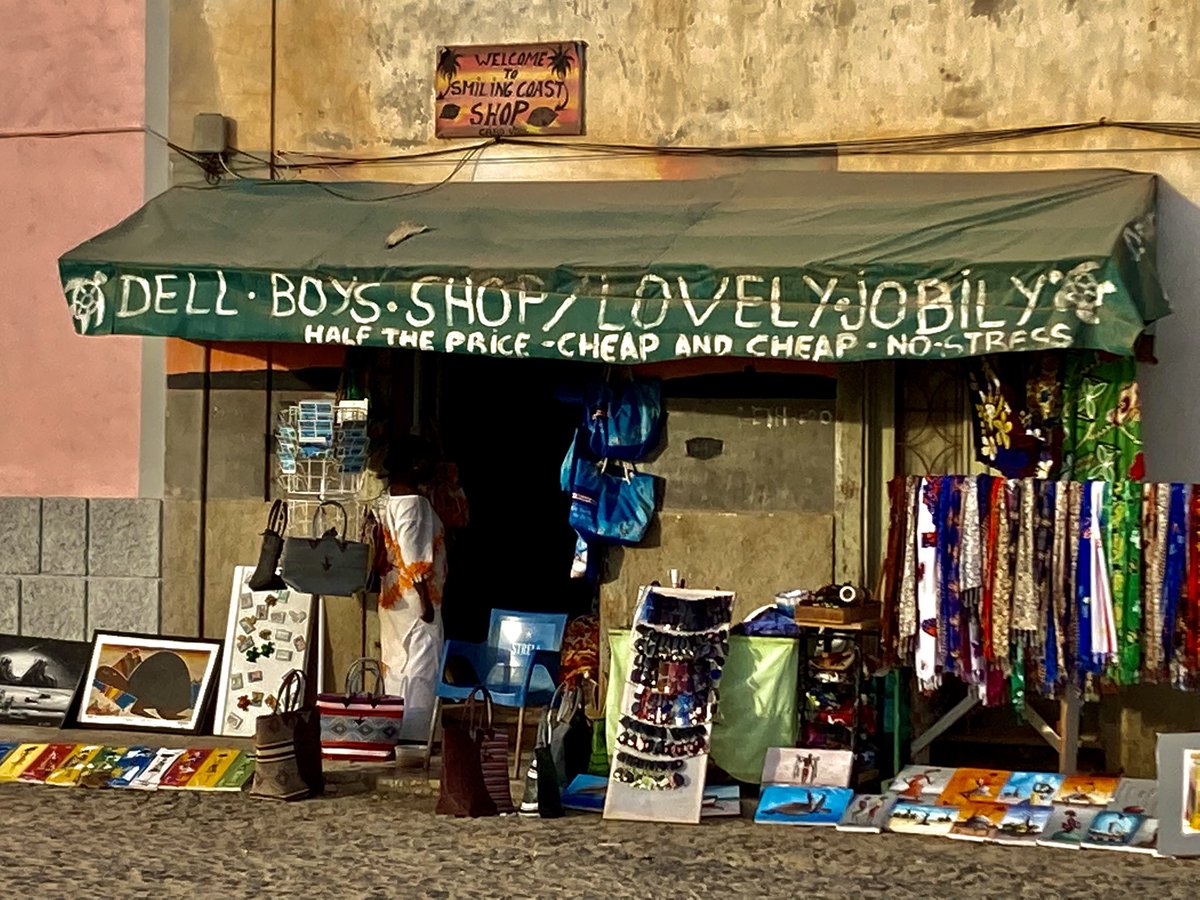 danielrhamilton's tweet photo. Spotted this afternoon on the island of Boa Vista (population: 5000) in Cape Verde, 450 kilometres off the coast of West Africa. An enduring 🇬🇧 cultural export! #noincometax #noVAT #nomoneyback #noguarantee #whydoonlyfoolsandhorseswork #lalalalalalalalalalalalalala https://t.co/tkOqtJZY0l