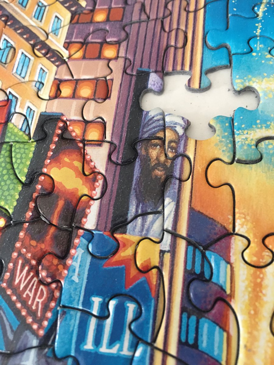 We’re doing a festive New Year’s Eve Times Square puzzle and inexplicably there’s a picture of Osama bin Laden in it.