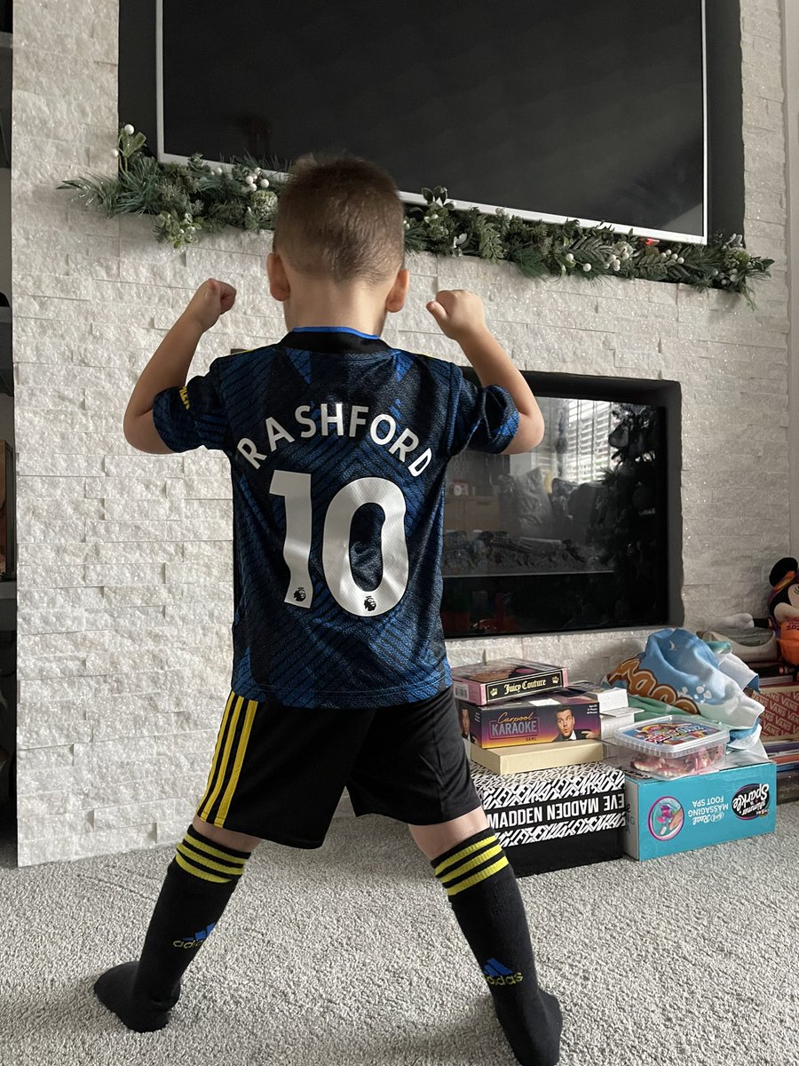 LeviWatkins3's tweet photo. New year, new Kit!
@ManUtd away kit with Lucian’s favourite player @MarcusRashford on the back! Honestly buzzing with how much he loves Football, &amp; United! #MUFC #HAPPYNEWYEAR2022 ⚽️ 🖤❤️ https://t.co/oyulvjDSjO