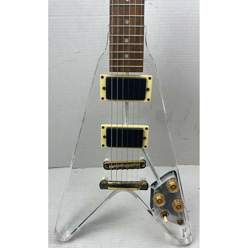 JamCityMusicUSA's tweet photo. #Galveston #flyingV #acrylic #Transparent #Electric #guitar - #Clear new strings, cleaned up and ready to rock! #RockNRollMachine https://t.co/k3uOew35BE