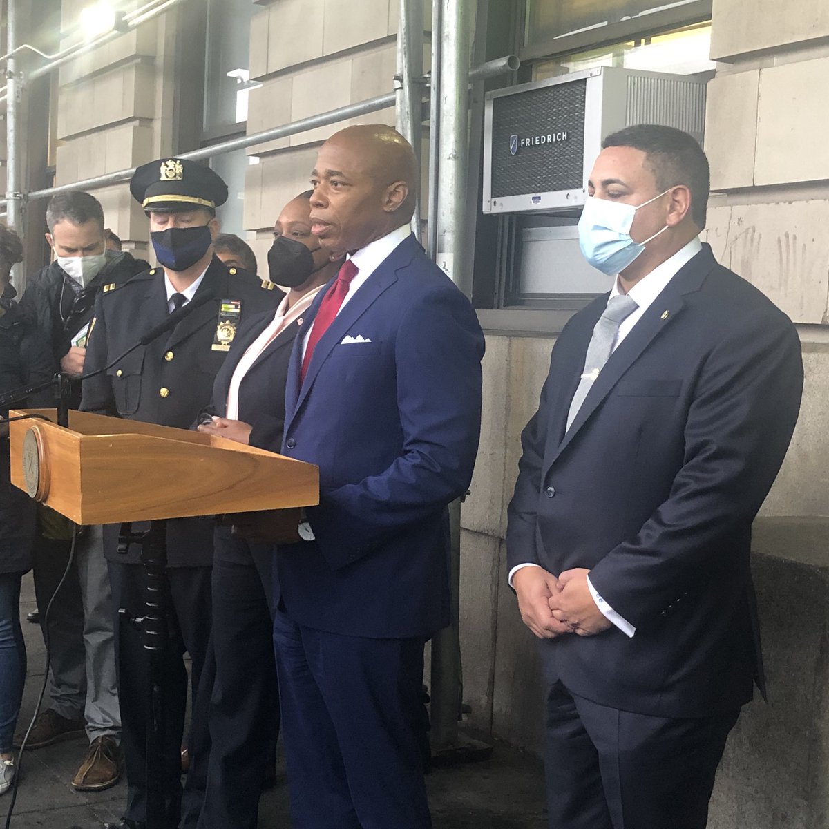 katie_honan's tweet photo. .@NYCMayor says today is a big day, standing in front of the precinct he was beaten inside as a teen. “I finally lead the demon right here in these streets. No longer living the trauma I experienced at this precinct. Back as the mayor of this entire police department.” https://t.co/UIzFX2Vwch