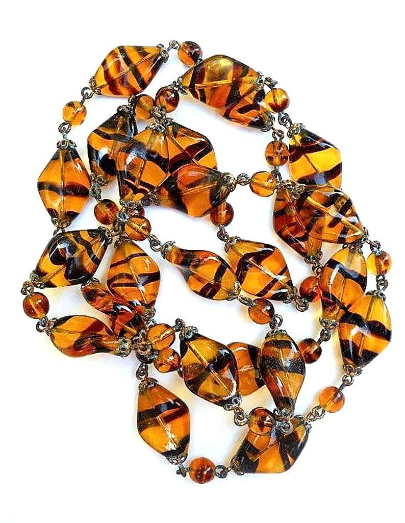 renaissancefai's tweet photo. Czech Tiger Stripe Necklace, Art Glass Beads Curve Twisted, 34 inches, Vintage https://t.co/lCborAhkU2 #orange #black #women #glass #bohohippie #vintagenecklace #czechnecklace #glassnecklace #operalength https://t.co/N1sSCpXhyu