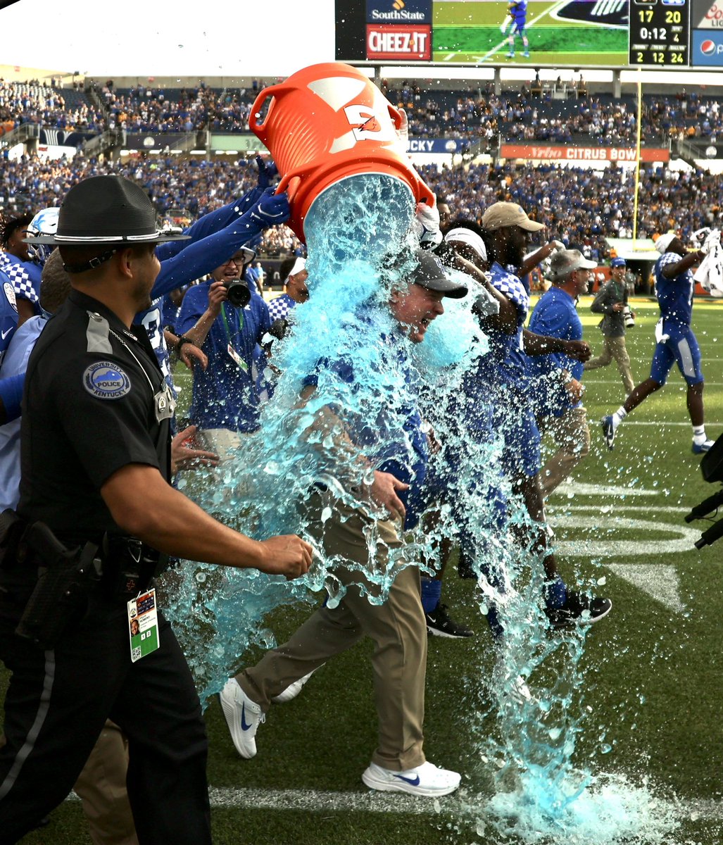 CitrusBowl's tweet photo. Wouldn’t expect any other color for @UKCoachStoops Gatorade bath! #BBN #CitrusBowl https://t.co/GH6badrQdS