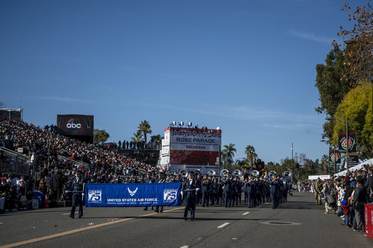 Travis60AMW's tweet photo. @usairforce Total Force @USAFBand featuring a majority of musicians from @BandGoldenWest at Travis, played today in the @RoseParade in Pasadena, California. To mark the beginning of #AF75, the band had 75 members and was in the 75th position. [2 mins]: https://t.co/LlR6sqrUBs https://t.co/QBnvctwxpM