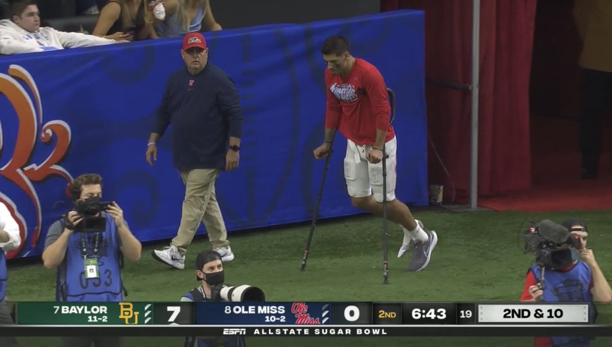 dpbrugler's tweet image. Matt Corral on crutches. Right ankle/lower leg injury. Severity unknown right now but can only hope not too serious.