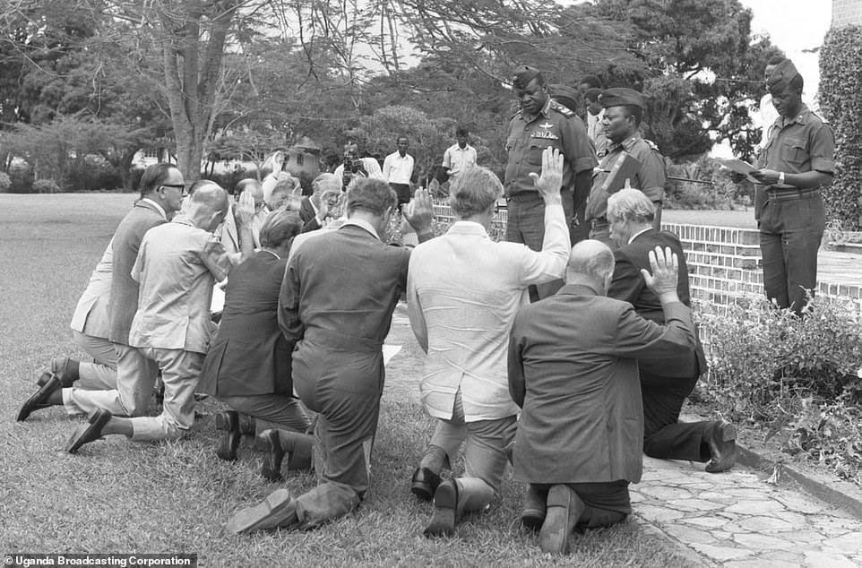 SpireJim's tweet photo. British men made to swear loyalty to Amin https://t.co/ejWrh8jAo9