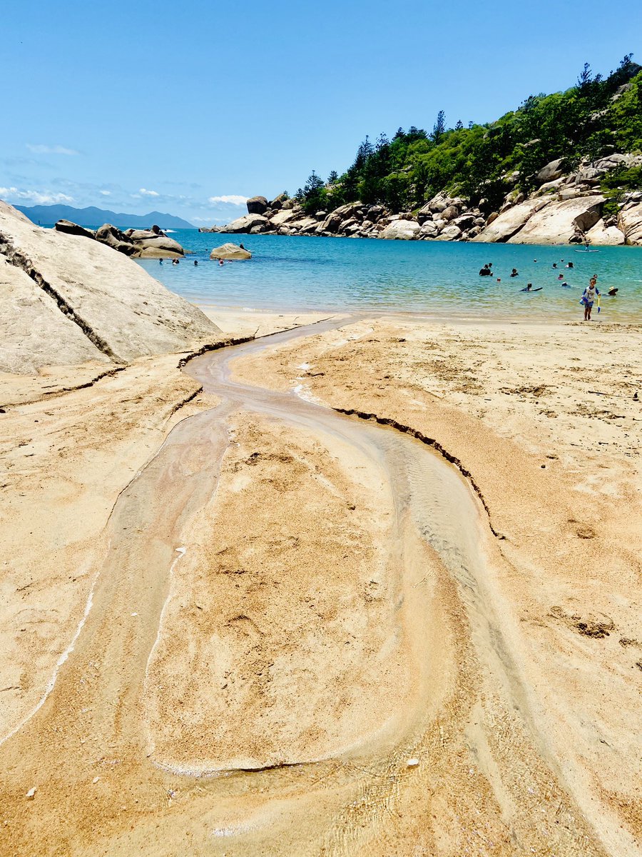 PTWNorth's tweet photo. Flowing out to sea on a bright Sunday morning at Queensland’s best beach. #nthqld #magicbeach https://t.co/L9PDzWUocu