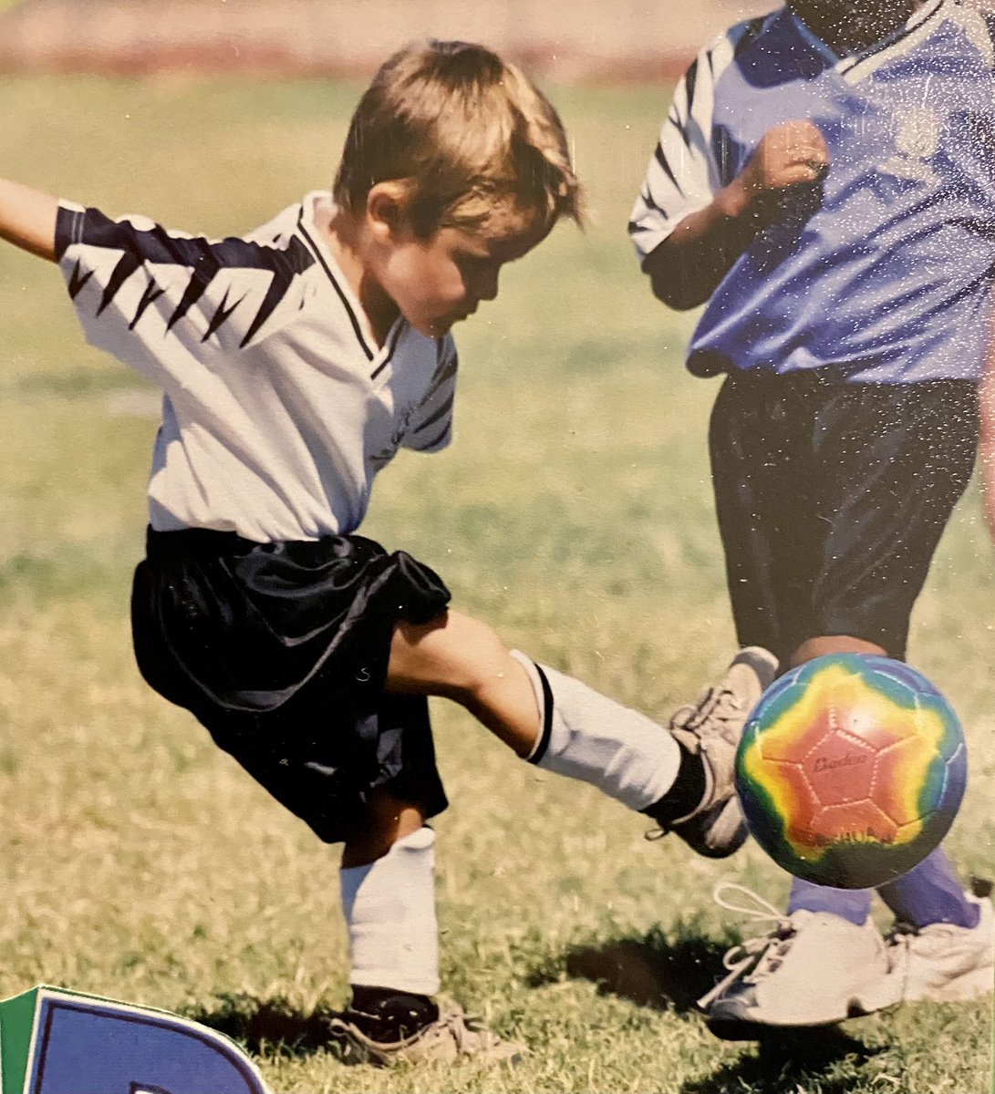 ryfoto's tweet photo. Son #3 turns 23 today. (How is it possible?) Two photos from his 1st year at the int’l school in the Netherlands (he’s in orange) show the diversity of his class. Friends &amp; cultures from all over the world. And the 3rd photo shows the beginning of a lifelong love of soccer. https://t.co/BMlZDKgcFN