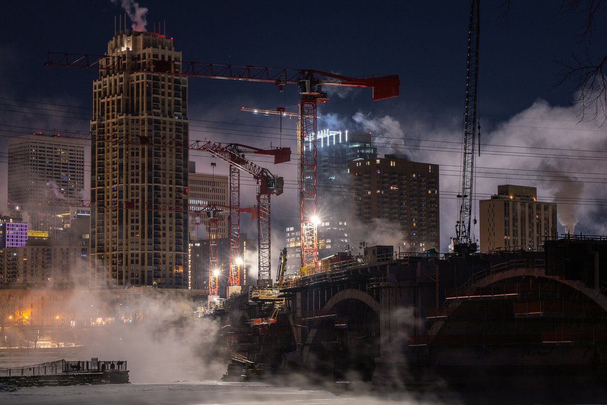 daviss's tweet image. Minneapolis gets hidden behind steam when it gets to -15F. Some photos from the early morning hours of January 2, 2022.